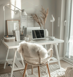 <p>A relaxing, white home office set-up in a bright room</p>
