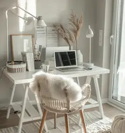 <p>A vertical nook used as a home office set-up in a small living space</p>